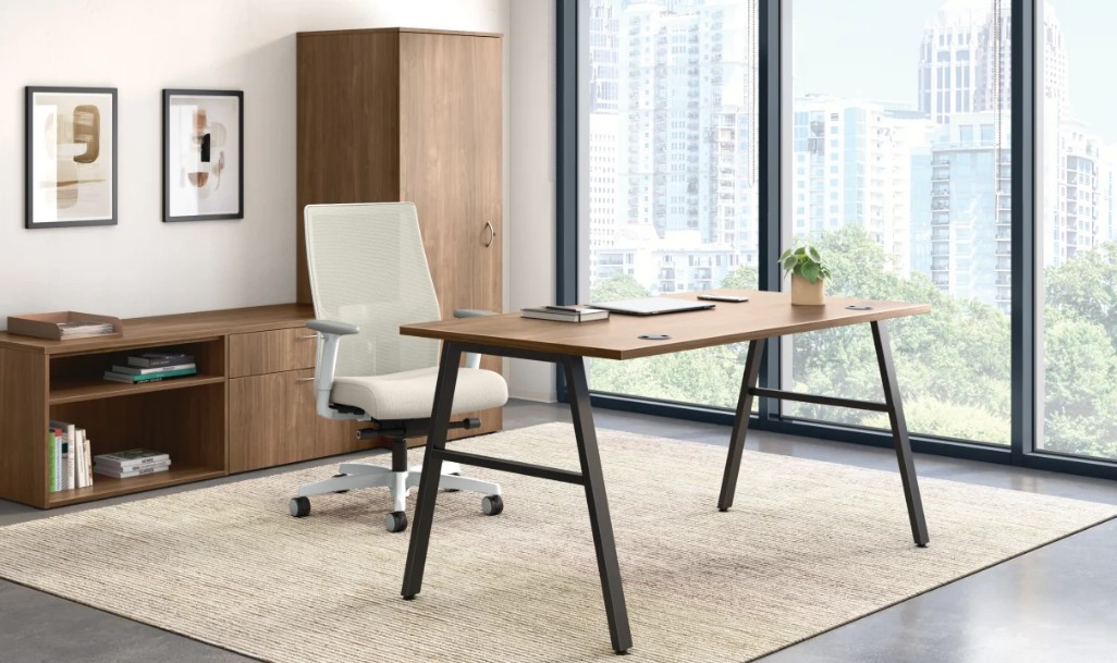 HON Ignition 2.0 mesh back task chair at a wood grain laminate desk in a private office with low storage