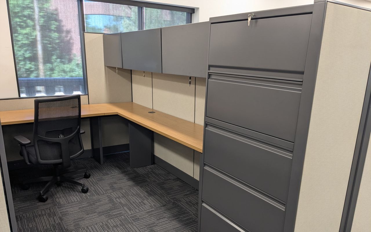 HON Abound 8x10 stand-alone powered workstation with overhead storage, lateral file and Harvest laminate worksurface, installed in an office in Phoenix, Arizona